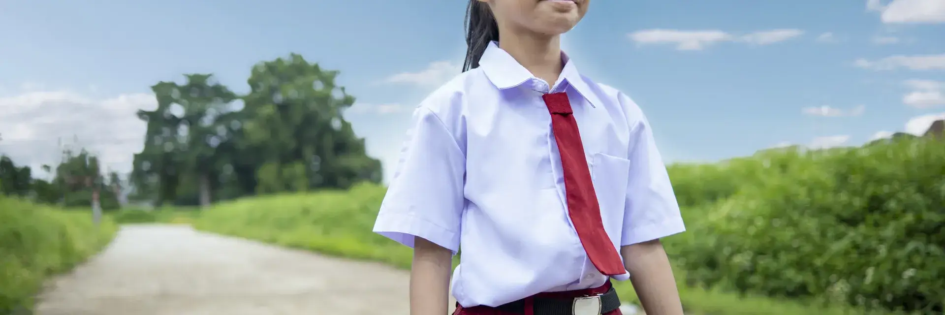 East Asian children in school uniforms in an Australian classroom